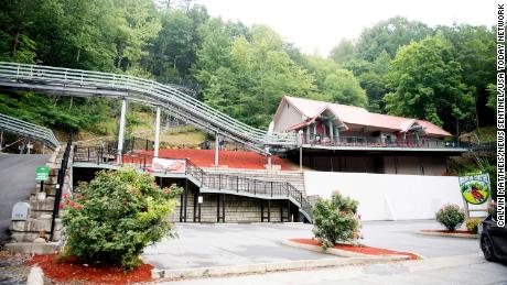 A rider was ejected from a Gatlinburg, Tennesse, roller coaster and flung onto the tracks