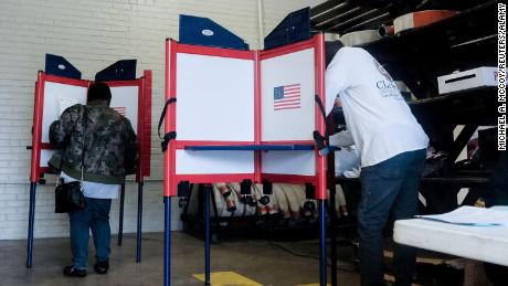 Voters cast ballots for the 2020 Democratic Primary Election inside of a polling station at the Selma Fire Station on Super Tuesday in Selma, Alabama, last year.
