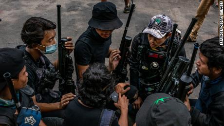 Anti-coup protesters hold improvised weapons during a protest in Yangon on April 3, in Yangon, Myanmar. 
