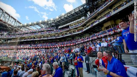 A view of the crowd and the fans and the stands during the playing of the Canadian and USA national anthems before the game between the Texas Rangers and the Toronto Blue Jays at Globe Life Field. 