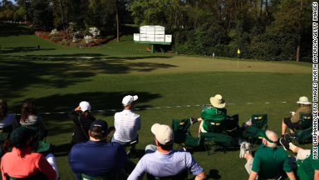 Patrons look on at the sixth green during a practice round prior to this year&#39;s Masters. 