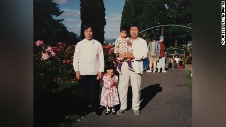 Selina and her sister with their grandparents in the US. 