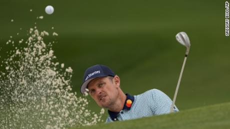 Justin Rose hits out of a bunker on the seventh hole during the second round of the Masters.