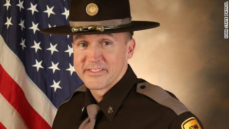Veteran Iowa State trooper shot and killed in line of duty by barricaded man, officials say