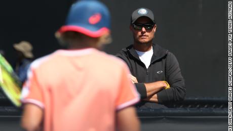 Lleyton Hewitt watches his son Cruz play in the 12 &amp; Under 2019 Australian Open.