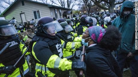 Police fire tear gas at protesters in a second night of demonstrations after Minnesota officer fatally shoots Black man