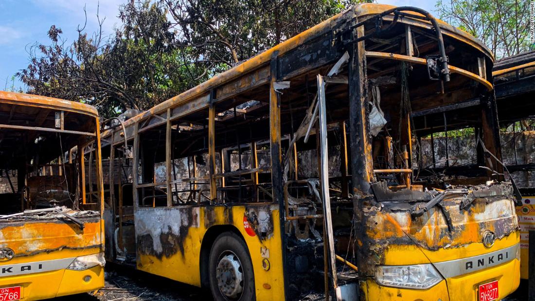 Buses from the Yangon Bus Service are seen burnt on April 12.