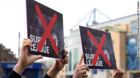 Chelsea fans protest against the proposed European Super League prior to the Premier League match between Chelsea and Brighton &amp; Hove Albion at Stamford Bridge on April 20, 2021.