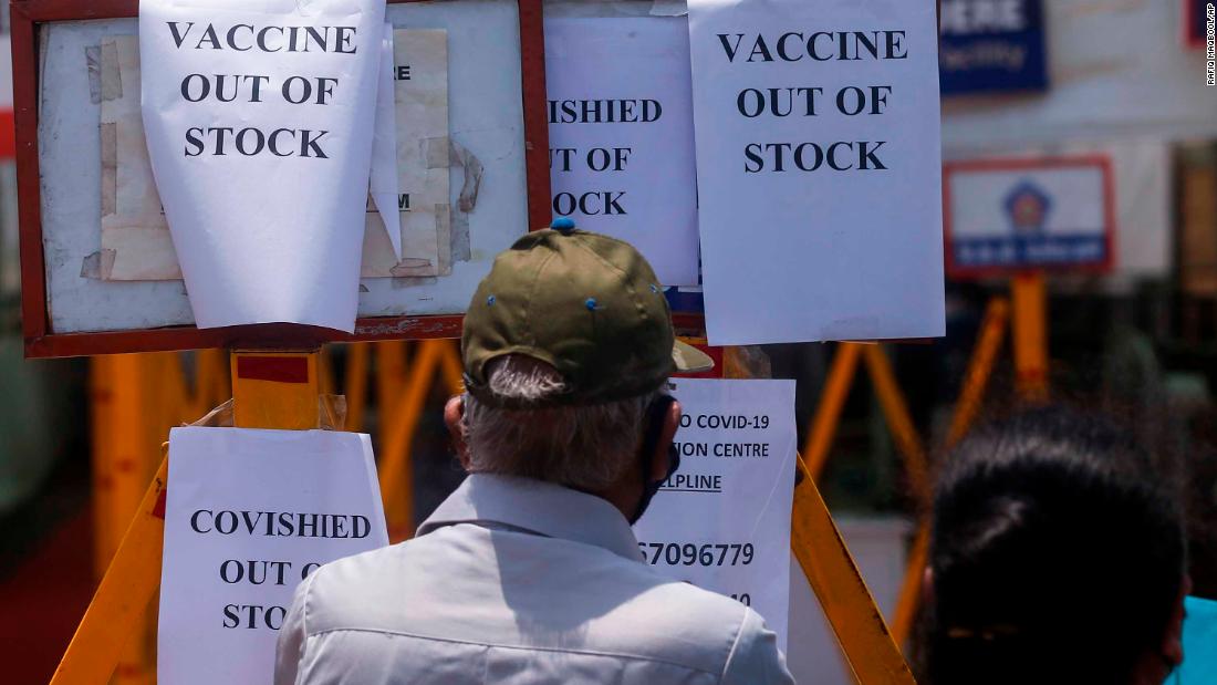 Signs inform people that a vaccination center in Mumbai was out of vaccines on April 20.
