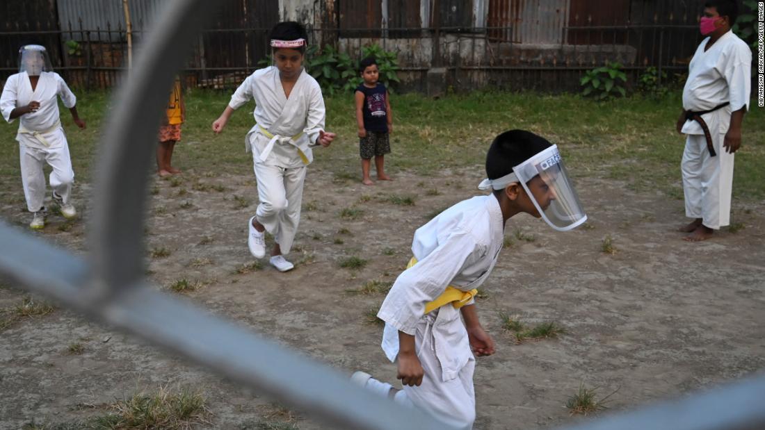 Children wear face shields at a martial-arts class in Kolkata on April 5.