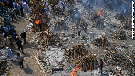 Burning funeral pyres of Covid-19 victims at a crematorium in India&#39;s capital on April 27.