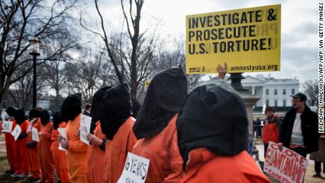 Protesters call for the closure of the Guantanamo Bay detention camp during a rally in Washington DC in January 2018.