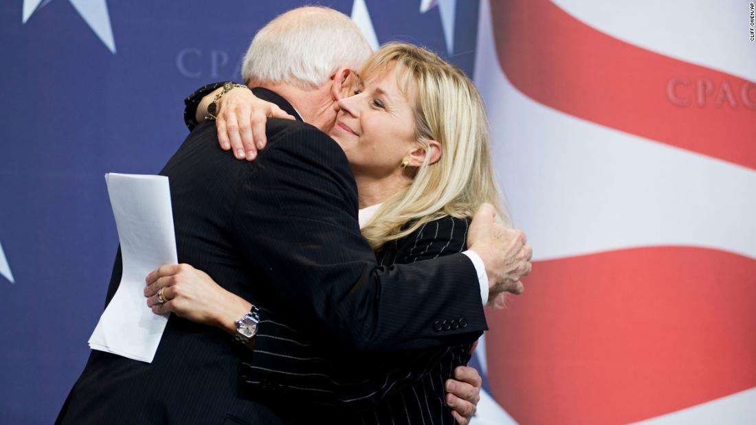 Cheney hugs her father at the Conservative Political Action Conference in 2010.