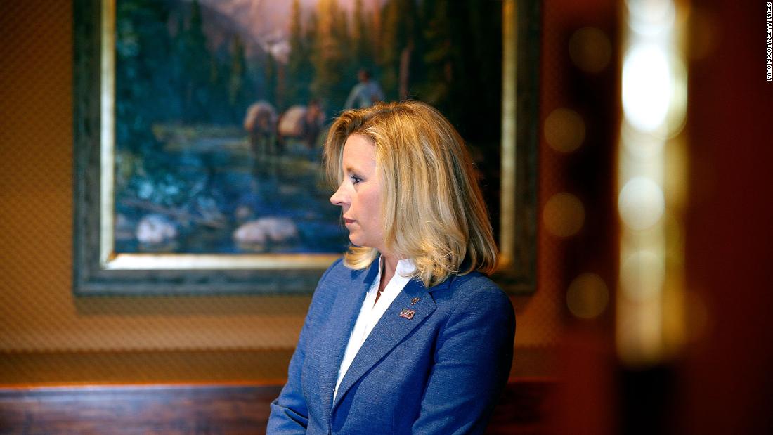Cheney waits for a news conference to begin in Cheyenne, Wyoming, in Julie 2013. Cheney was running for the US Senate seat held by longtime incumbent Mike Enzi. She dropped out of the race in January 2014.