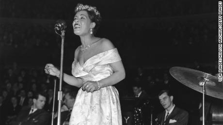 Billie Holiday performs on stage on February 14, 1954.