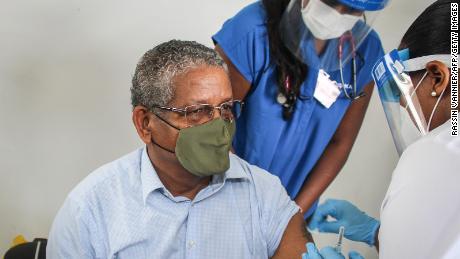 President of Seychelles Wavel Ramkalawan receives the first dose of the Covid-19 vaccine at the Seychelles Hospital in Victoria on January 10, 2021. 