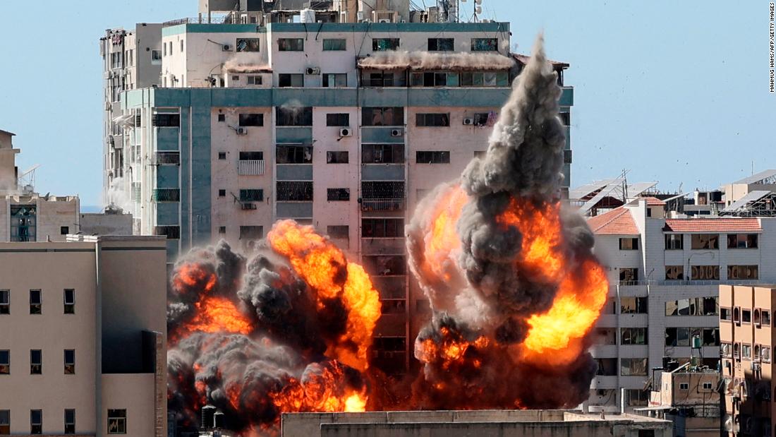 A ball of fire erupts from the Jala&#39;a Tower, which houses the Associated Press, Al Jazeera and other media offices, as it is &lt;a href=&quot;https://www.cnn.com/2021/05/15/media/associated-press-al-jazeera-gaza-bombings/index.html&quot; target=&quot;_blank&quot;&gt;destroyed by an Israeli airstrike&lt;/a&gt; in Gaza City on Saturday, May 15.