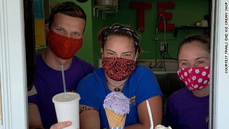 Trails End Ice Cream shop employees in North Conway, New Hampshire, will continue wearing masks at work this summer even though they will be vaccinated, owner Nancy Clark said.