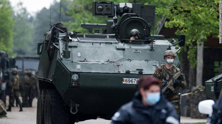 Police hunt for man who had rocket launcher and threatened Belgium's top virologist