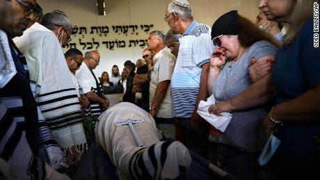 Mourners attend the funeral of Yigal Yehoshua on Tuesday.