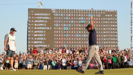 Mickelson celebrates on the 18th green after winning the 2021 PGA Championship.