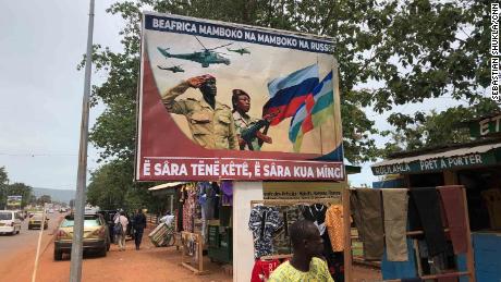 The posters in Bangui are reminiscent of old Soviet propaganda.  The posters read: "Central African Republic goes hand in hand with Russia"  And "Talk a little, do a lot of work."