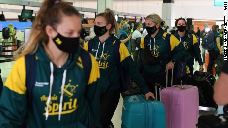 Australian softball players prepare to leave for the Tokyo Olympics.