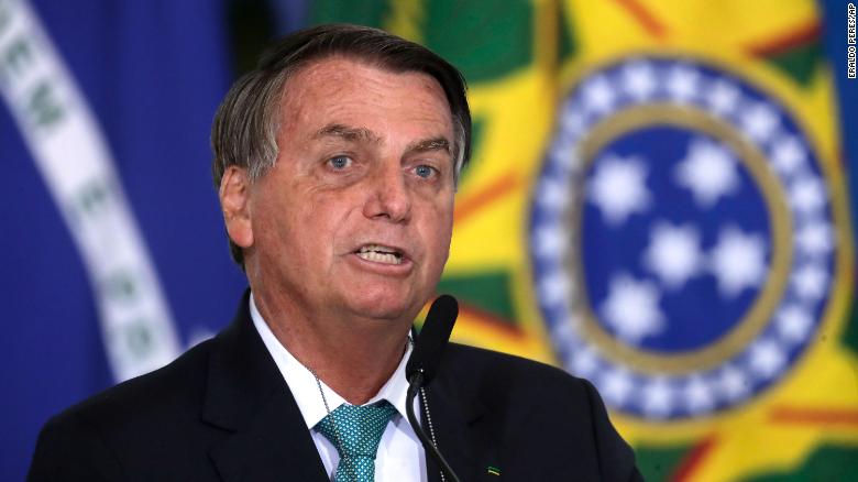 Brazil's Bolsonaro says he regrets Covid-19 deaths, but aims to host Copa America