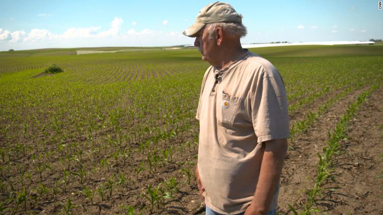 Farmer Brian Meyer looks over his 2000 acres in Monona, Iowa where he grows corn and soy beans. SOO Green is paying him to bury transmission lines along a rail line on is property that will bring renewable energy to Chicago.