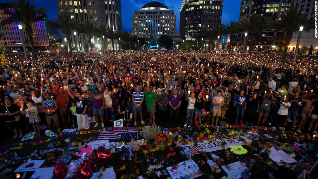 Thousands gather for a vigil outside the Dr. Phillips Performing Arts Center in Orlando.
