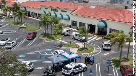 A gunman fatally shot a 1-year-old boy and his grandmother at a Florida grocery store