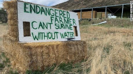 A sign in Tulelake, California, that says &quot;Endangered farmer can&#39;t survive without water.&quot;