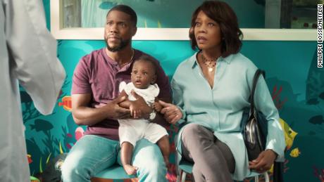 Kevin Hart (left) and Alfre Woodard (right), who plays Marian, are shown in a scene from &quot;Fatherhood.&quot; 