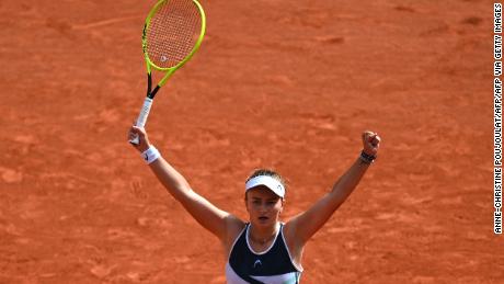 Barbora Krejcikova celebrates after winning the French Open singles title.