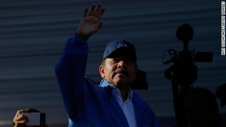 Nicaraguan President Daniel Ortega waves to supporters during a rally in Managua on August 22, 2018.