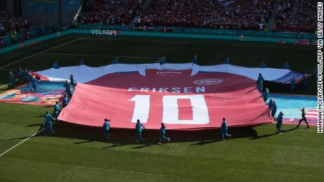 A giant jersey of Denmark&#39;s midfielder Christian Eriksen is put on display on Thursday. 