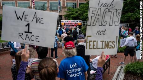 People took part in a rally on Saturday, June 12 at the Loudoun County Government Center in Lesburg, Virginia, against the racist theory criticized at the school. 