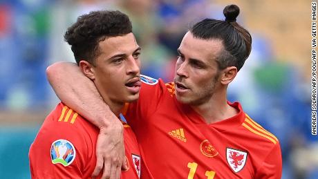 Gareth Bale, right, consoles Ethan Ampadu after his teammate&#39;s red card. 