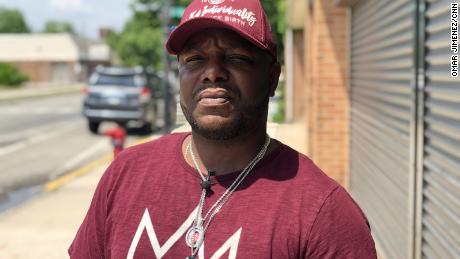 Jervon Hicks stands outside CRED&#39;s office in his South Side Chicago neighborhood of Roseland.