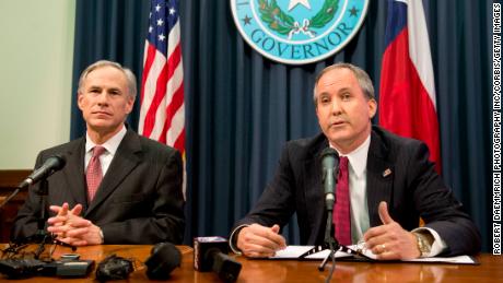 Texas Gov. Greg Abbott and Texas Attorney General Ken Paxton hold a press conference on February 18, 2015 to address a Texas federal court&#39;s decision on the immigration lawsuit filed by 26 states challenging former President Obama.