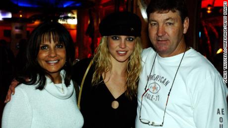 Britney Spears (center) with her parents, Lynne and Jamie Spears.