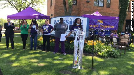 Chaunte Jones speaking at an &quot;Essential Worker Appreciation Day&quot; event with Gov. Gretchen Whitmer in Detroit, Michigan, earlier this month. 