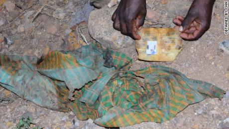 One photograph from the scene of clothing and an ID card left at the scene of the massacre in Mahibere Dego, Tigray.