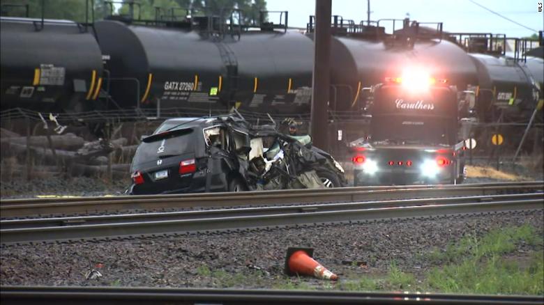 Three people are dead and three children injured after a vehicle was struck by a train