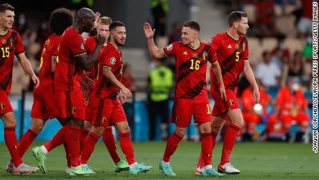 Hazard celebrates with his  teammates after scoring against Portugal. 