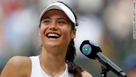 Raducanu smiles during a media interview after beating Romania's Sorana Cirstea in the third round of Wimbledon.