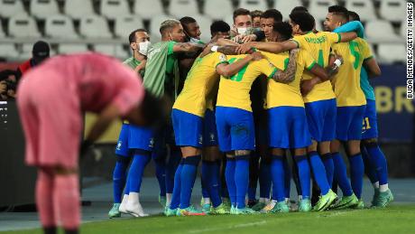 Brazil celebrate their ticket to the final, where they will meet either Argentina or Colombia on Sunday. 