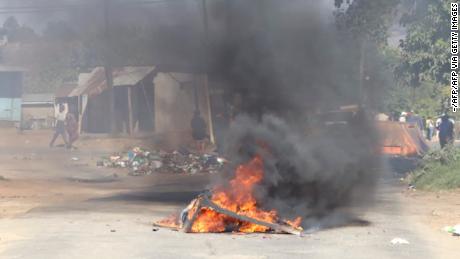 A burning barricade in the road in Mbabane, eSwatini, on June 29, 2021. Demonstrations escalated radically in eSwatini as protesters took to the streets demanding immediate political reforms.