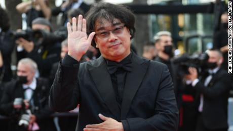 South Korean director Bong Joon-Ho arrives for the opening ceremony and the screening of the film &quot;Annette&quot; at the 74th edition of the Cannes Film Festival in Cannes, southern France, on July 6, 2021. (Photo by CHRISTOPHE SIMON / AFP) (Photo by CHRISTOPHE SIMON/AFP via Getty Images)
