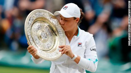 Ashleigh Barty kisses the Venus Rosewater Dish Trophy after winning her first Wimbledon title. 